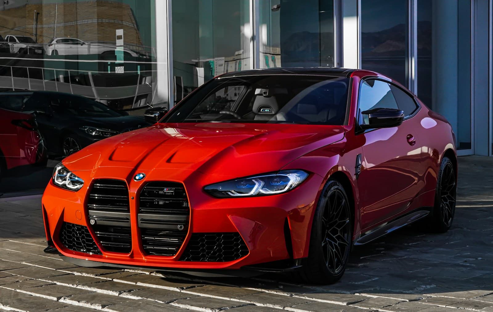A vehicle presented in a private showroom setting